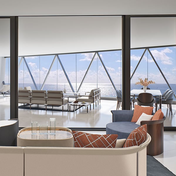 Bentley Residences east unit great room with floor-to-ceiling ocean views and Bentley Home furnishings