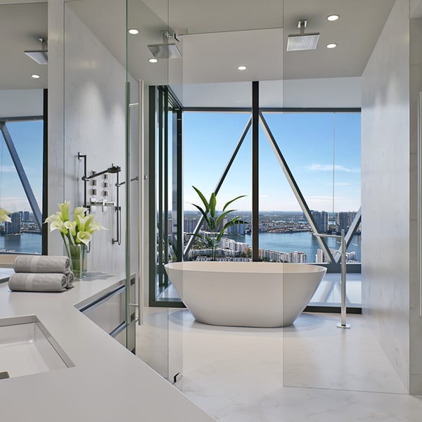 Bentley Residences west unit primary bathroom with contemporary finishes and ocean views