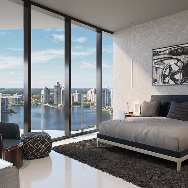 Bentley Residences west unit primary bedroom with panoramic views and bespoke Bentley Home furnishings